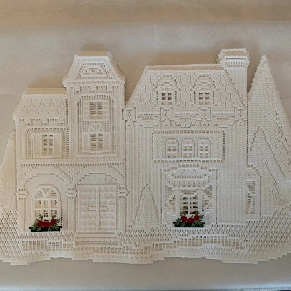 White Holiday House Lace placemats and runner.